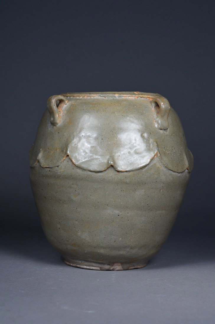 Old Chinese Celadon Glazed Jar with Four Handles: Chinese celadon glazed porcelain jar; featuring molded lotus design and four handles; base unglazed; H: 13 cm, D: 13 cm; Toronto Estate Collection
