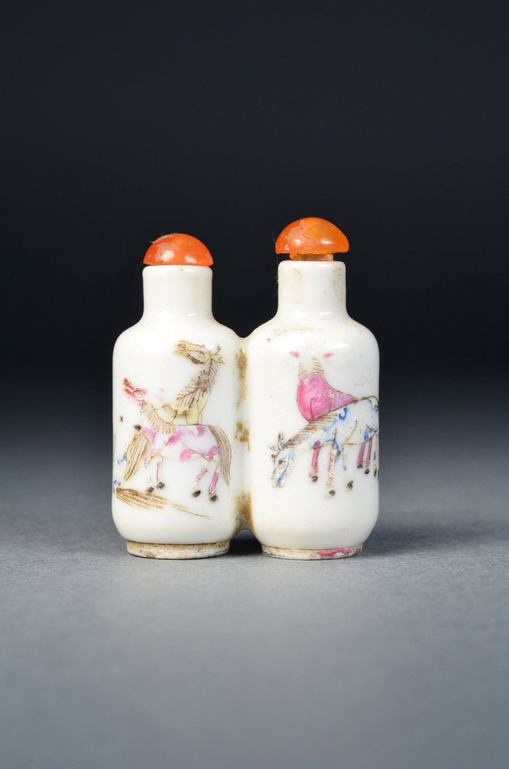 Chinese Famille Rose Double Snuff Bottle Marked: Chinese Famille Rose enameled porcelain snuff bottle; featuring dragon and phoenix design; pair of horses featured on verso; iron-red two-character mark on base; H: 5 cm, W: 4 cm