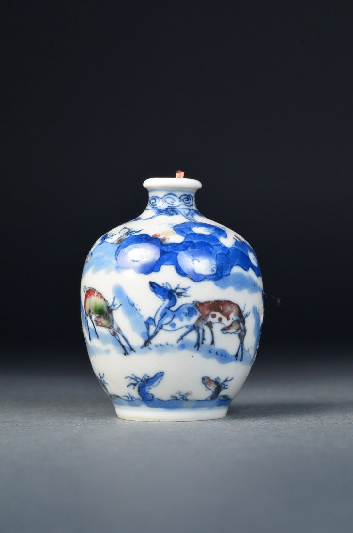 Chinese Blue & White Snuff Bottle Yongzheng: Chinese blue and white porcelain snuff bottle; globular body featuring deer with brown enameling; six-character Yongzheng Mark on base; H: 6 cm, D: 4.5 cm