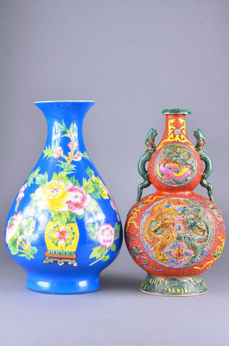 Set 2 Vases Turquoise Blue & Carved Vase Qianlong: Set of two Chinese porcelain vases; pear-shaped turquoise blue vase featuring lotus spray; carved double gourd vase featuring dragons in relief; six-character Qianlong Mark; H: 34 cm