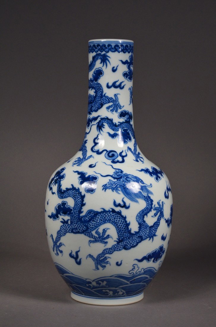 19th Chinese Blue & White Porcelain Vase Jiaqing: Fine 19th Chinese blue and white porcelain stick vase: depicting four five-toed dragons chasing flaming pearl; six-character Jiaqing mark; H: 35 cm, D: 16.5 cm