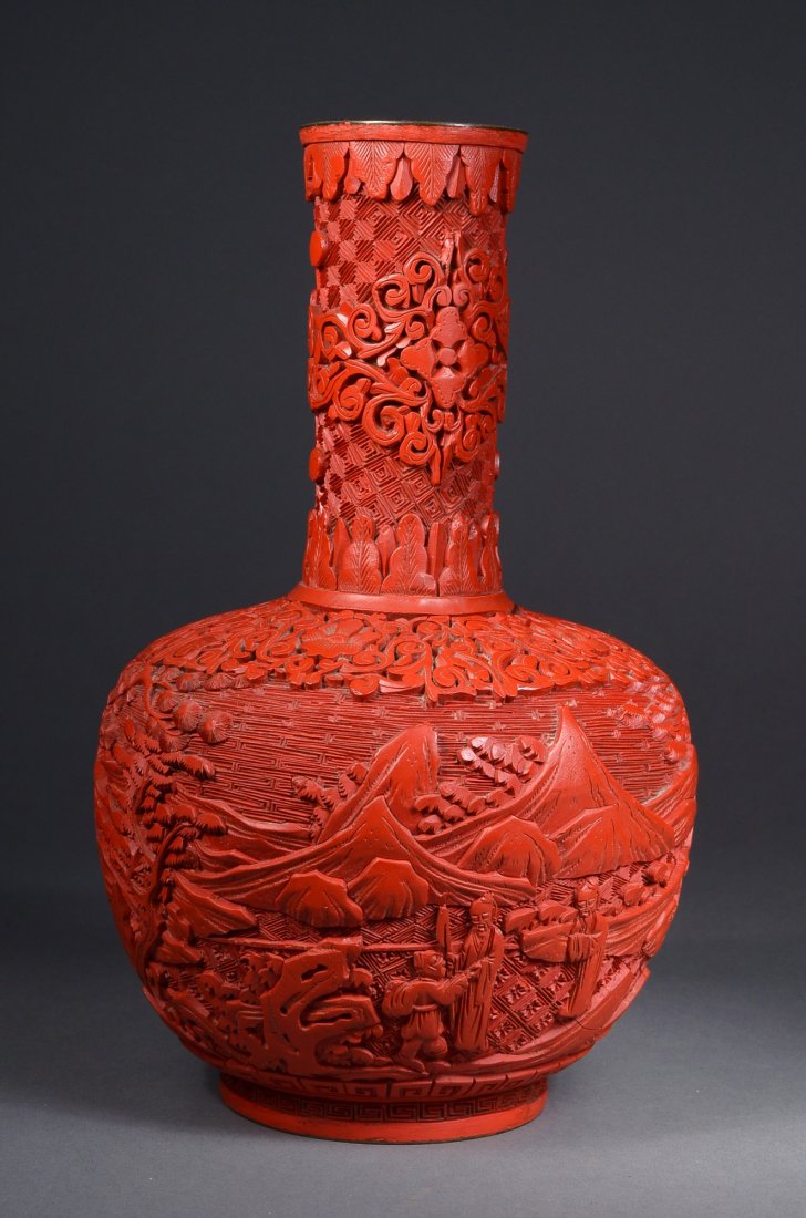 Chinese Cinnabar Lacquer Vase Landscape Scene: Chinese cinnabar lacquer vase; of ovoid form: featuring figural scene of sages carved in relief amongst trees and mountains, between bands of scrolling flowers on geometric grounds; above tapering sho