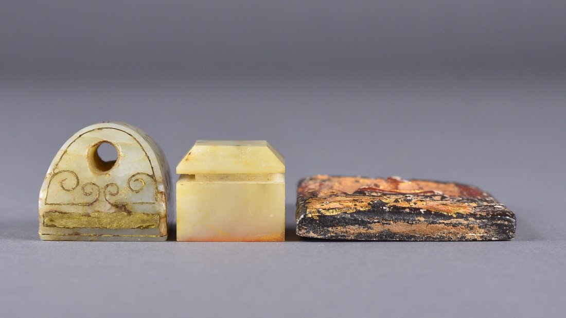 Set 3 Chinese Jade Seals & Plaque: Set of three Chinese pair of jade seals and small bronze plaque; L: 2.5 cm, W: 2.5 cm, 36 grams (larger jade seal); L: 2. cm, W: 2 cm, 18 grams ( smaller jade seal); L: 6 cm, W: 4.25 cm, 29 grams (pla