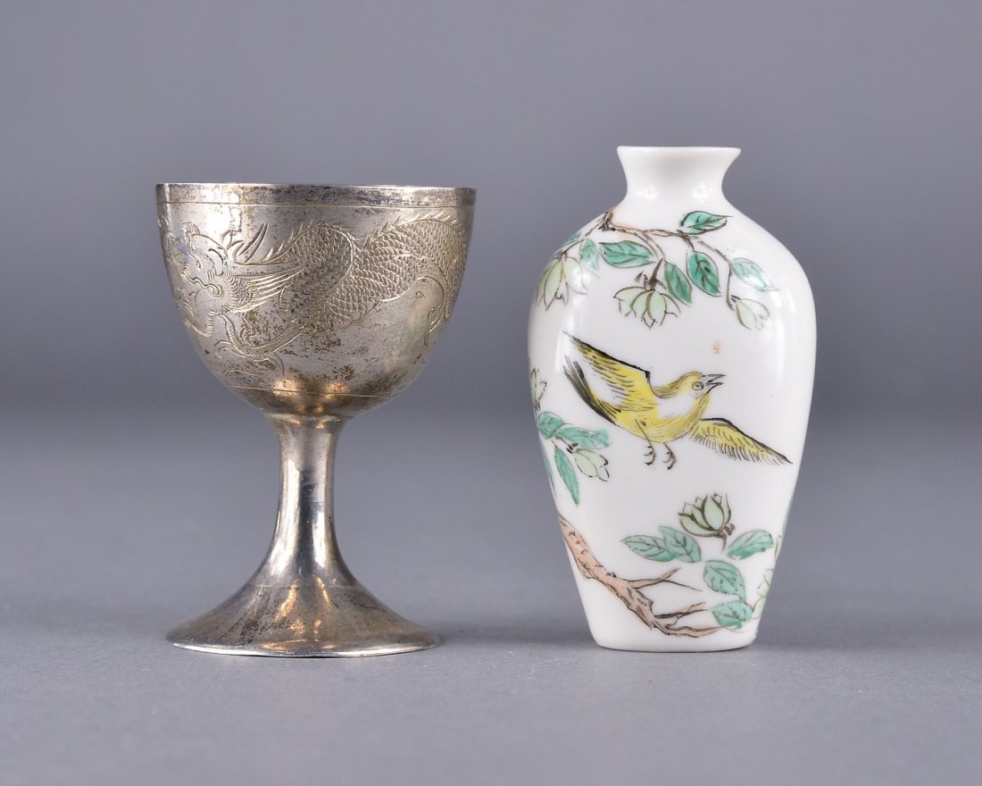 Hong Kong Sterling Silver Chalice & Snuff Bottle: Set of two Chinese Hong Kong silver chalice featuring incised dragon design and Minguo porcelain snuff bottle; H: 6 cm, D: 4 cm, 39 grams (silver chalice); H: 7 cm, W: 4 cm (snuff bottle)