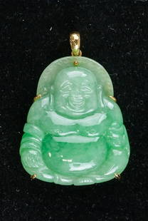 Green Chinese Jade Buddha 18k Gold Bail: Chinese jade pendant. Pale green tone with 18k stamped bail. Carved as laughing Buddha. 4.5 x 4 cm, 27 grams.