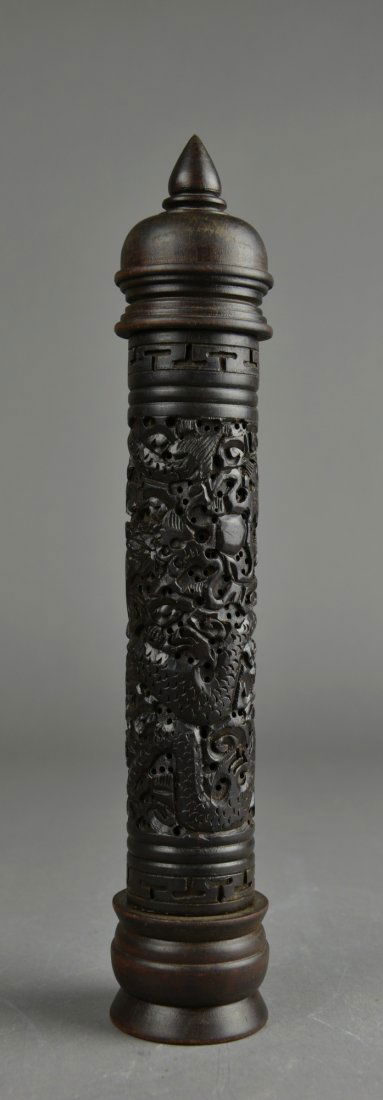 Chinese Carved Wood Incense Perfumer: Chinese carved wood incense perfumer; of cylindrical form featuring dragons carved in openwork relief; sectional three piece set; H: 31 cm, D: 5 cm, 219 grams