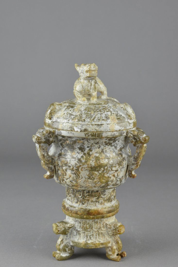 Archaic Chinese Carved Jade Sectional Censor: Well hollowed archaic Chinese carved jade sectional tripod censer, with base and cover; ovoid body featuring carved antithetical chilong in relief with three handles in form of chilong; domed cover fe