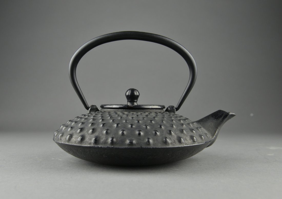 Antique Japanese Bronze Tea Pot Signed w/ Mark: Antique Japanese bronze tea pot; squat ovoid body featuring raised bosses with knob handles; maker's mark on base; D: 17 cm, H: 13 cm, 1669 grams