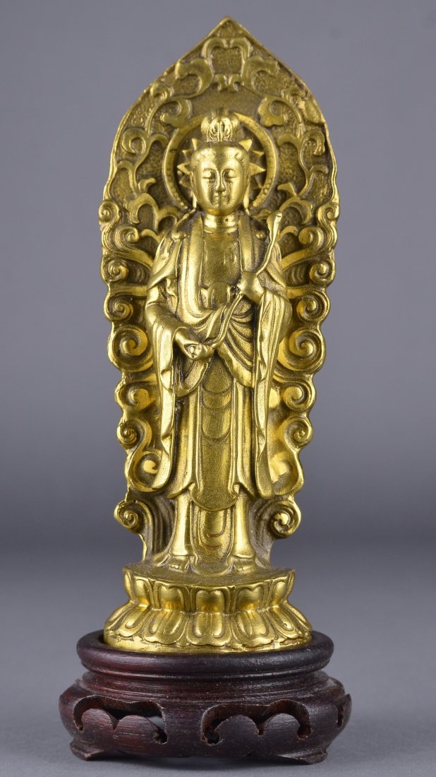 20th Century Sino-Tibetan Bronze Buddha: 20th Century Sino-Tibetan Bronze Buddha figure; featuring standing Guanyin on double lotus pedestal holding ruyi scepter in front of aureole with lotus scroll design; H: 17 cm, L: 6 cm, 461 grams, woo