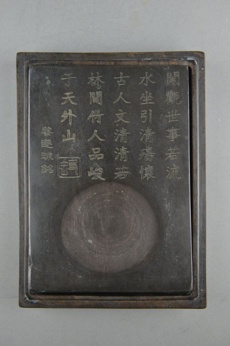 Chinese Daoguang Period Ink Stone w/ Rosewood Box: Chinese Daoguang Period carved ink stone; featuring incised script and seal; enclosed within wood carved case; L: 7.75 cm, W: 13 cm, Thickness: 1.75 cm, 1033 grams; L: 21 cm, W: 15 cm, H: 5 cm, 1161 g