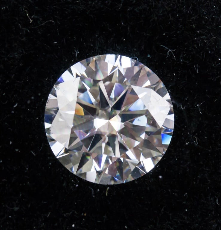 3.0CT GH VVS1 Unmounted Moissanite GRA: Unmounted round brilliant cut moissanite, measuring 9.0mm, weight of 3.0 CT. Color = GH. Clarity = VVS1, Cut = Excellent. GRA Report Number: 107314903