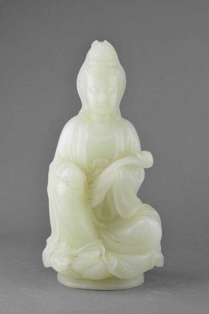 Chinese White Jade Carved Large Guanyin: Chinese white jade carved Guanyin in seated position holding ruyi scepter. The stone of translucent white tone. H 32 cm, W 15 cm, D 12 cm, 4738 grams