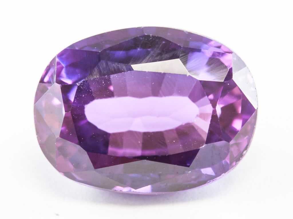 11.45ct Oval Cut Blue Natural Alexandrite GGL: One (1) 11.45 ct oval cut blue to purple natural alexandrite. Origin: India. 14.12 x 10.61 x 7.47 mm. Accompanied by GGL certificate.