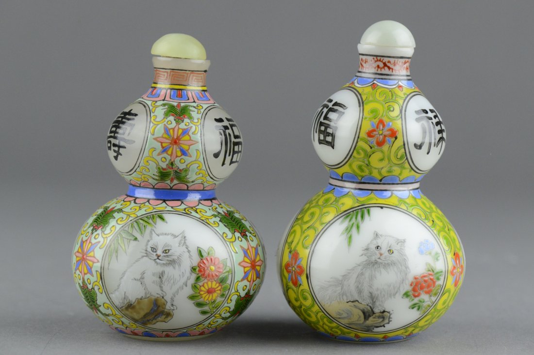 Pair of Glass Snuff Bottles Qianlong Mark 20thC: Chinese glass snuff bottles with caps; of double gourd forms; brightly painted with various auspicious objects in oval panels amid floral sprays on celadon grounds; body marked Fu Lu Shao; small rim c