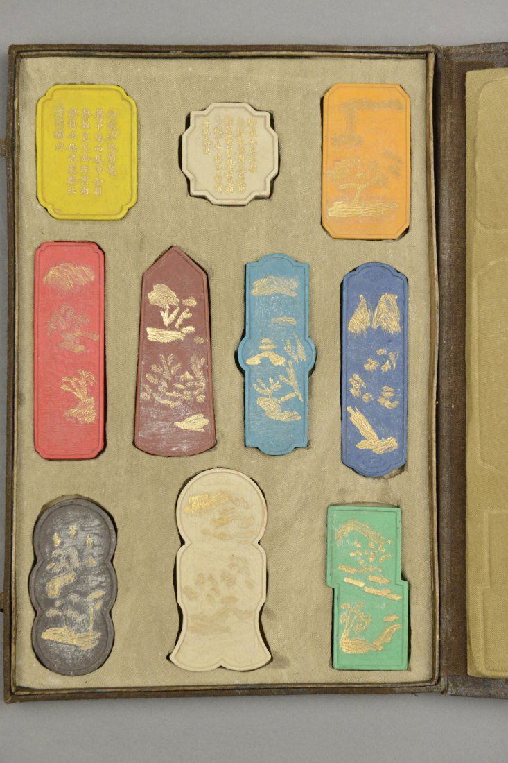 Chinese 10 Pieces Gilt Ink Stone Set Xihu: Chinese carved gilt ink stone set, box marked Xi Hu Landscape ink stone set. Ten pieces of ink stone various in colours. Each marked different passages and carvings praising the beauty of Xi Hu. Each