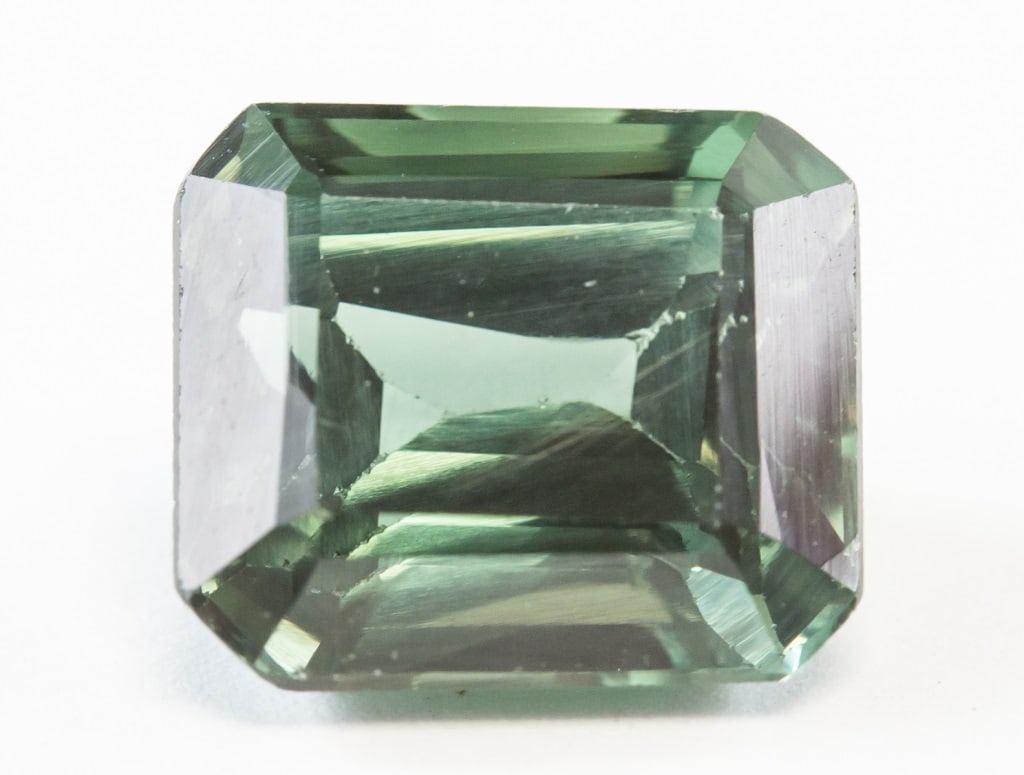 6.10ct Emerald Cut Green Natural Tourmaline GGL: One (1) 6.10 ct emerald cut green natural tourmaline. Origin: Afghanistan. 10.46 x 9.30 x 6.50 mm. Accompanied with GGL certificate.