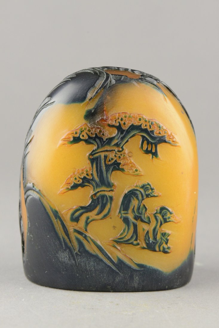 Chinese Carved Tianhuang Stone Crow Skin: Of apricot tone with crow skin, the Tianhuang stone is carved with continuous landscape with two sages resting under pine tree. H: 10.5 cm, 8.5 cm, 859 grams.