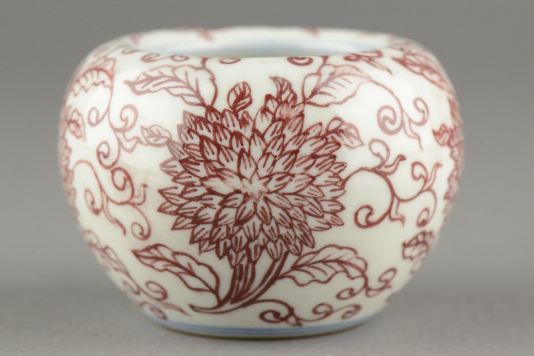 Chinese Porcelain Famille Rose Waterpot Qianlong: Chinese small porcelain waterpot, painted monochromatic chrysanthemums and sprays, bottom marked blue four character Qianlong reign mark. H: 5 cm, D: 6.5 cm, 116 grams.
