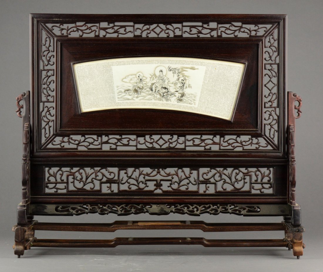 Chinese Ivory Screen Carved Micro Buddhist Script: Antique and rare, Chinese old ivory screen in open works wooden frame. Ivory piece in fan shape carved Kwanyin, fairies and Buddhist scripts in low relief. (Frame) H: 38 cm, W: 43 cm, (picture) W: 27 