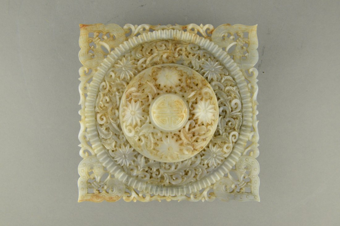 Rare Qing Hetian Jade Openwork Carved Waterpot: Rare and antique, ornate Chinese Qing Period white jade carved water pot, of squatted form supported by four tiny footing. Body richly decorated with peonies and sprays with open work design on top si