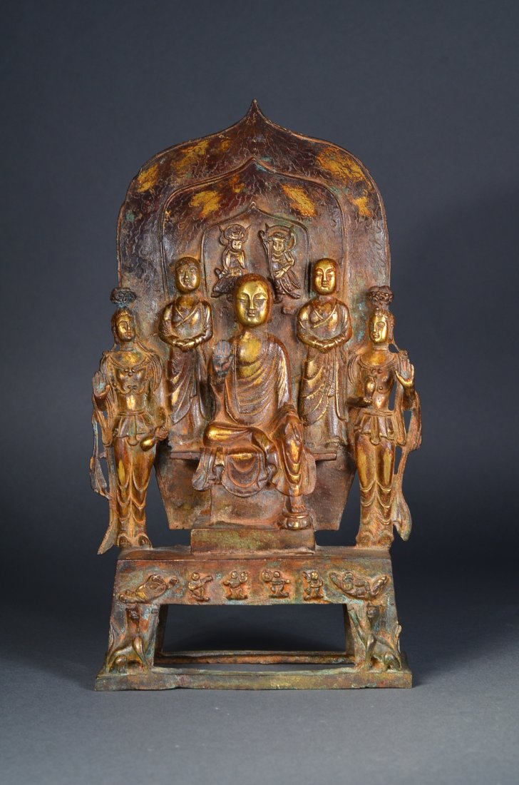 Chinese Western Wei Gilt Bronze Buddhist Stele: Rare and finely case Chinese Western Wei Dynasty (535-556) gilt bronze stele; well cast Buddha seated in Lalitasana on pedestal wearing flowing robes falling in crisp graceful folds, seated between tw