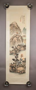 Chinese WC on Paper Signed Wang Jian w/ Seals: Watercolor on paper. This artwork depicts a mountainous landscape with layered cliffs, dense foliage, and a river winding through the valley. A solitary figure in yellow is shown walking near the rive