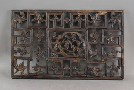 Antique Chinese Wood Carved Door Panel: Antique Chinese Wood Carved Door Panel, rectangular in form, composed of hardwood with a central circular medallion featuring detailed bird and floral motifs. Surrounding the medallion is a grid of si
