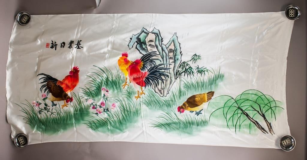 Chinese Embroidery on Silk Rooster: Chinese silk embroidery panel depicting three roosters and a hen amidst floral and bamboo scenery, set against a cream silk ground. The roosters are rendered with vivid red, yellow, and black threads,