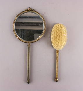 Antique Victorian Brass Hand Mirror & Brush: Antique Victorian Brass Hand Mirror and Brush Set, late 19th century. Comprising a matching mirror and hairbrush, each with brass handles and frames featuring embossed floral and scrollwork decoration