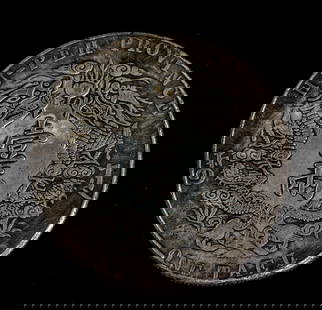 1904 Chinese Guangxu 1 Tael Hupeh Province Coin: China, Hupeh Province, 1904, 1 Tael coin issued under the Guangxu Emperor. Obverse features dual dragons facing a central flaming pearl, surrounded by English inscriptions “HU-PEH PROVINCE&rdquo; an