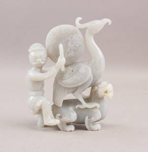Chinese Hetian White Jade Carved Sculpture: This finely crafted sculpture features a figure holding a staff or scepter. Intertwined with a dragon and phoenix. The Hetian white jade showcases its translucent quality. H: 17 cm, W: 15 cm, 1,021g C