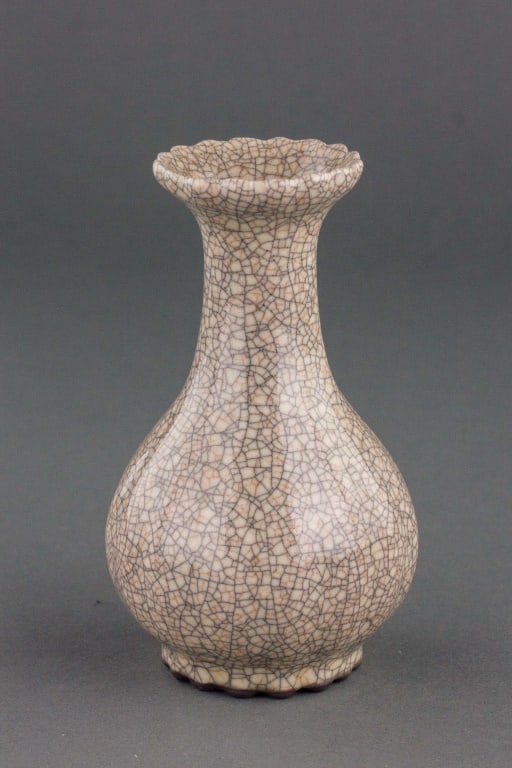 Chinese Song Style Crackle Porcelain Vase: Chinese Song style porcelain vase. Globular body with foliated mouth rim; covered by brown crackle glaze; 12 cm x 7 cm, 191 grams Country of Origin: Asia *Information on Tariffs on Art and Antiques: O