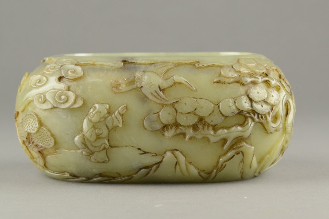 Celadon Jade Bowl Carved Village Scene Qianlong Mk: Chinese celadon jade carved bowl, featuring continuous landscape with villager, goat, pine tree and crane. Bottom incised four character Qianlong mark. H: 6 cm, W: 15 cm, 580 grams. Provenance: T. Ng