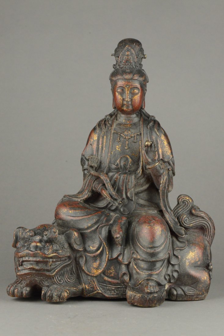 Chinese Gilt Bronze Kwanyin Qing Period Ming Mark: Chinese bronze cast Kwanyin, possibly Qing period. With down cast eyes and serene expressions, the deity is holding a pearl on one hand and ruyi scepter on another. Figure adorned with flowing robes a