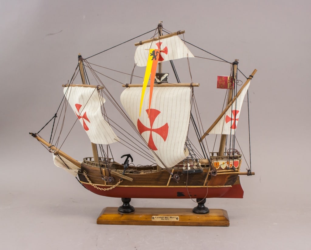 Sailing Vessel Carabela Sta. Maria, Ano 1492 Model: Model of Sailing Vessel Carabela Sta. Maria. Constructed from wood with fabric sails and rigging, representing the flagship of Christopher Columbus’s first voyage. Features three masts with cross-em