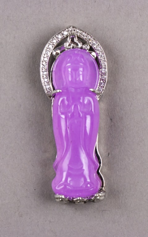 Vintage Lavender Hardstone Silver-plated Pendant: Vintage lavender hardstone silver-plated pendant, the carved figural plaque mounted in a silver-plated frame set with small clear stones, fitted with an integrated suspension loop for wear. H: 6 cm, W
