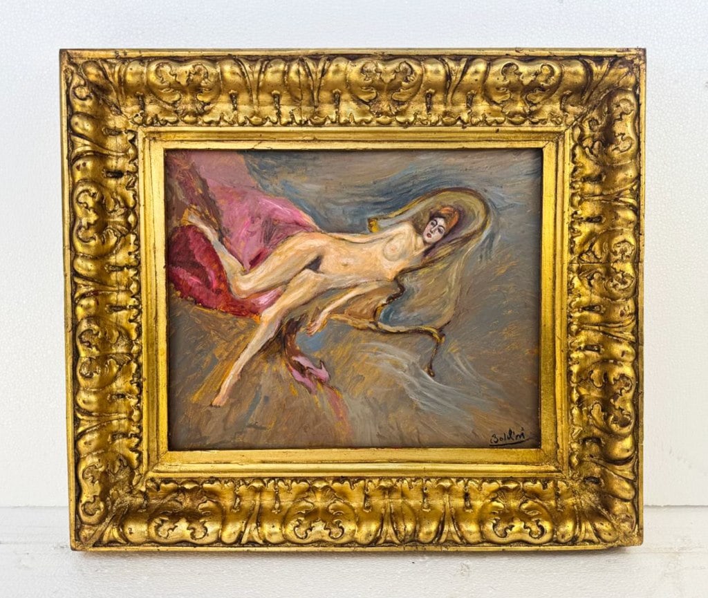 OOC Signed Giovanni Boldini D' Arte Venezia Vicent: Oil on canvas, framed. Attributed to Giovanni Boldini (1842 - 1931). The painting presents a reclining nude figure set against a fluid, atmospheric background of blue, pink, and brown tones, the body