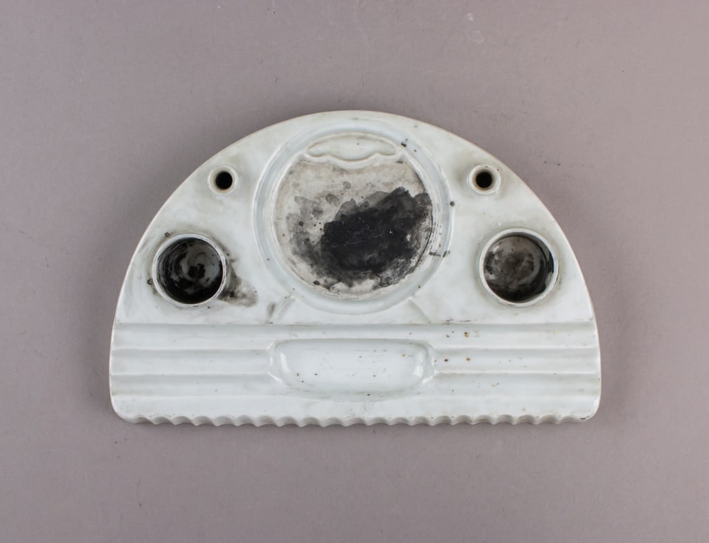 Rare Republic China Era Army Porcelain Ink Stone: Porcelain ink stone, Republic China era, army issue, semi-circular form with three ink wells and two brush holes. Central well shows ink residue; lower section with ridged mixing surface and recessed