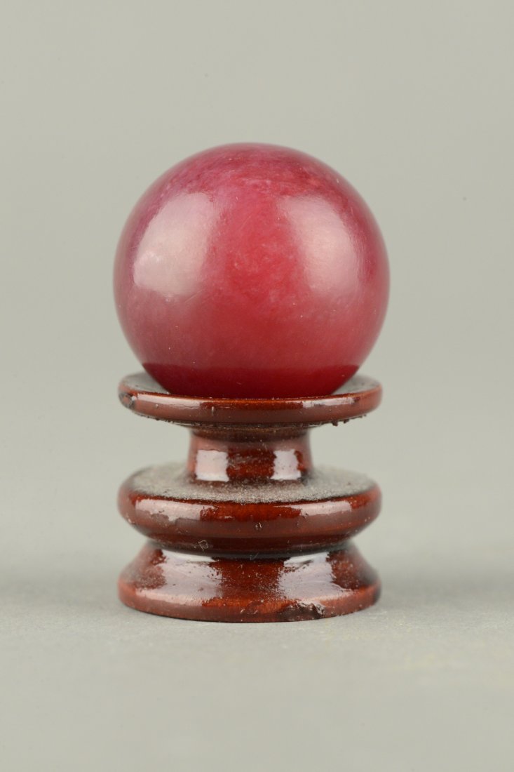 Chinese Red Agate Carved Sphere on Custom Stand