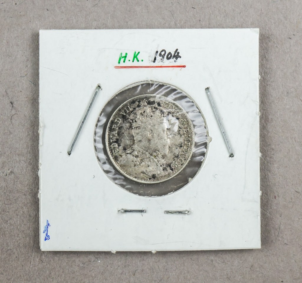 1904 Hong Kong 5 Cents Edward VII Coin: A 1904 Hong Kong five-cents coin of Edward?VII, showing his right-facing portrait with surrounding English legend on the obverse and Chinese characters with “Hong-Kong 1904 Five Cents” on the