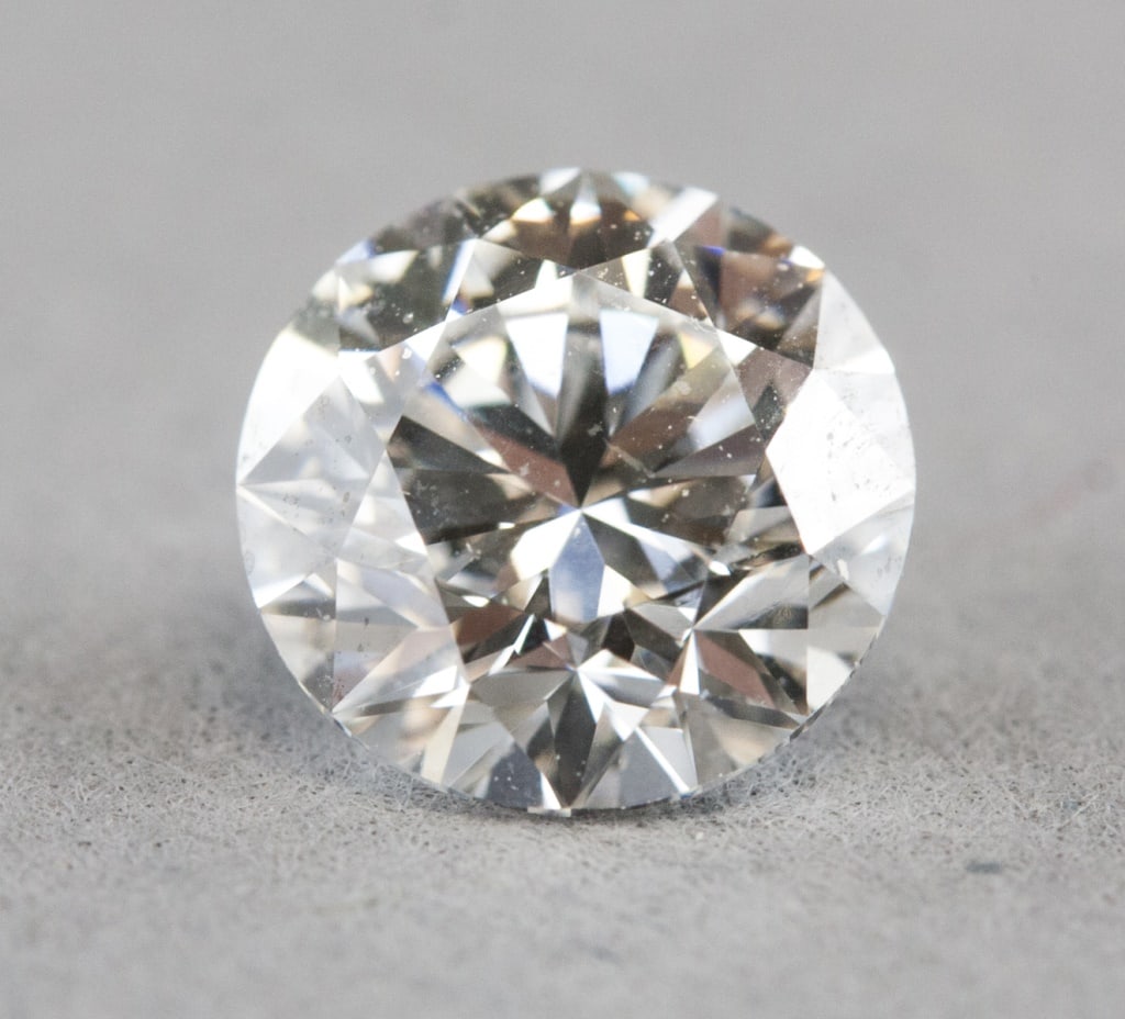 1.03ct VS1 Laboratory Round Diamond w/ IGI Report: Laboratory-grown diamond certified by the International Gemological Institute (IGI), report no. LG744516726, dated October 28, 2025. Round brilliant-cut measuring 6.45–6.50 × 4.02 mm, weighing 1.03