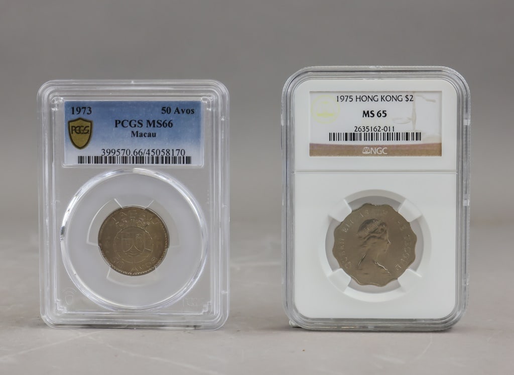 1973 PCGS Macau Coin & 1975 NGC Hong Kong Coin 2pc: Pair of certified coins comprising a 1973 Macau 50 Avos graded PCGS MS66 and a 1975 Hong Kong $2 graded NGC MS65, each housed in its respective encapsulated holder with full label details. H: 9 cm, W: