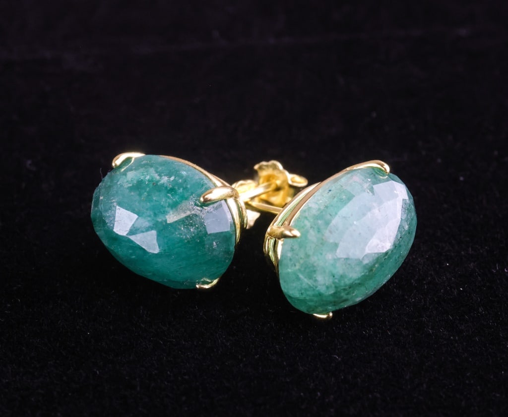 14.20 Silver Emerald Earrings Jewel Scan Appraisal: Pair of oval-cut natural emerald earrings totaling 14.20cts, claw-set in gold-plated 925 sterling silver mounts weighing 4.50g, accompanied by a 2025 Jewel Scan appraisal detailing stone measurements,