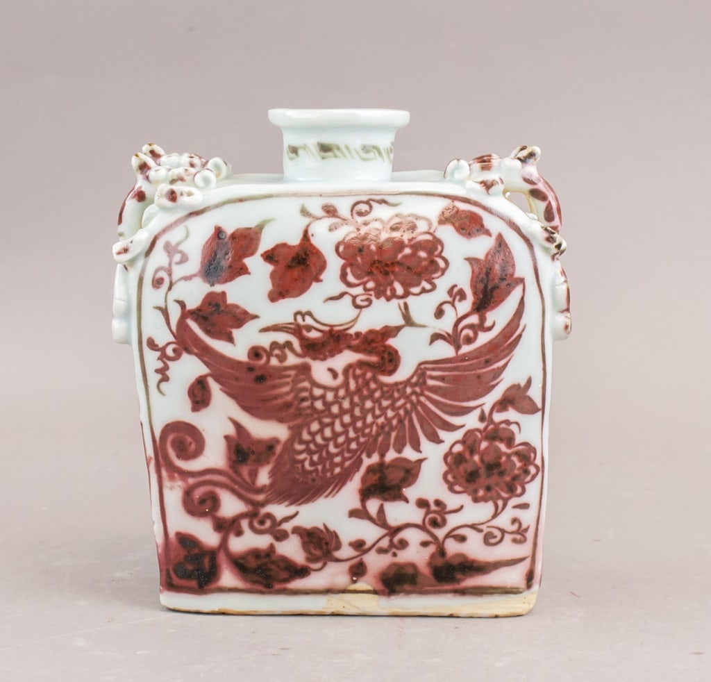 Chinese Copper Red Porcelain Flash Moon Vase: This rectangular porcelain vase features a copper red underglaze decoration depicting a phoenix surrounded by floral motifs. The vase has a square body with rounded shoulders and a short cylindrical n