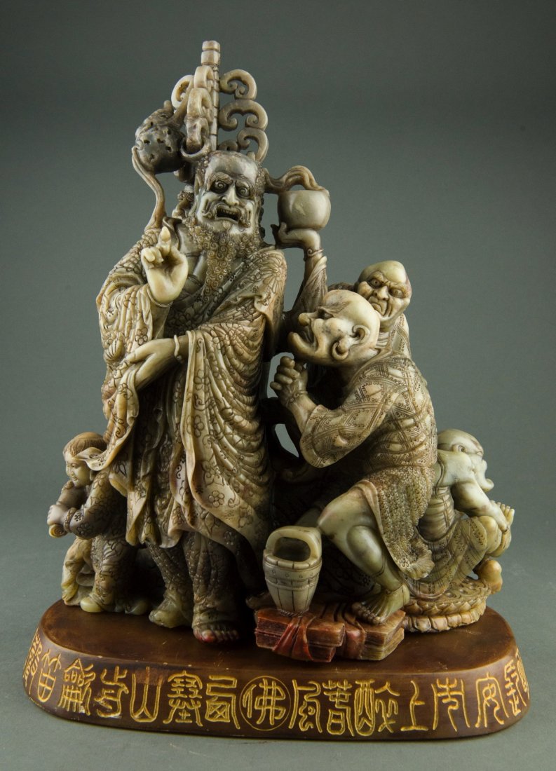 Chinese Shoushan Stone Carved Group of Lohans: Finely carved, Chinese Shoushan stone carved group of Lohans, on hardstone stand incised gilt Buddhist script. H: 32.5 cm, W: 26 cm, 6.75 kg without stand.
