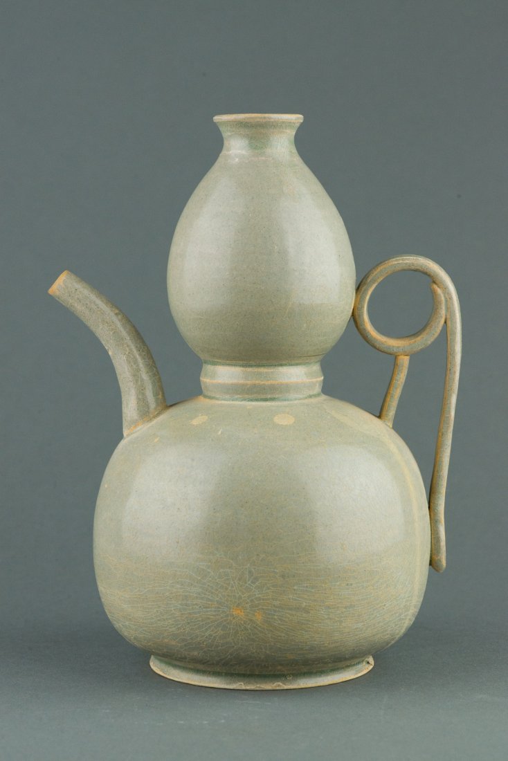 Fine Chinese Song Style Celadon Pottery Ewer: Fine Chinese Song style pottery ewer, of curious double gourd form with narrowed waist, flanked with slender spout and handle on sides. H: 20 cm, W: 14.5 cm, 814 grams.