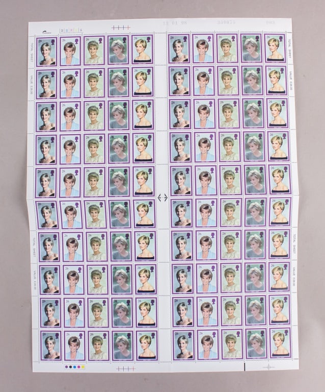 1997 UK Princess Diana Stamp Sheet: This uncut sheet features multiple rows of 26p stamps, each depicting an image of Princess Diana with a light blue background and a purple border. The stamps include the profile of Queen Elizabeth II 