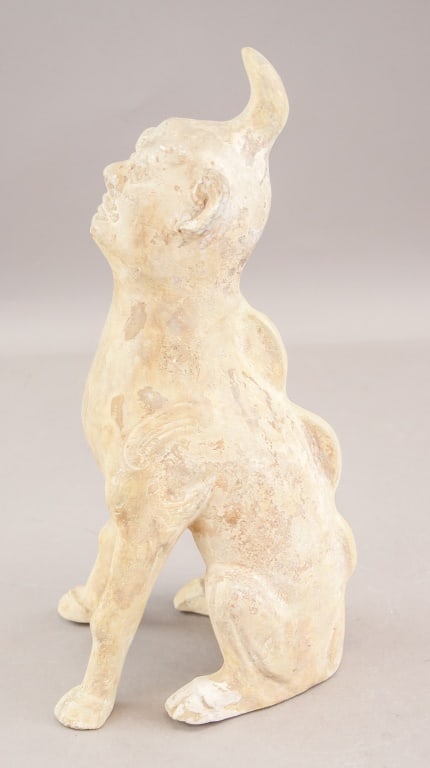 Chinese Han Dynasty White Pottery Sculpture: Chinese white pottery animal. Shaped as animal sitting on its back legs with small bumps on the spine. Possibly from the Han dynasty. 35 x 13 cm, 1374 grams.