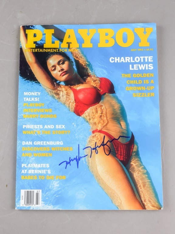 1993 Playboy Magazine Signed Hugh Hefner: A July 1993 issue of Playboy magazine featuring the standard cover with highlighted articles including features on Charlotte Lewis, Barry Bonds, and additional editorial content; the cover bears a blu
