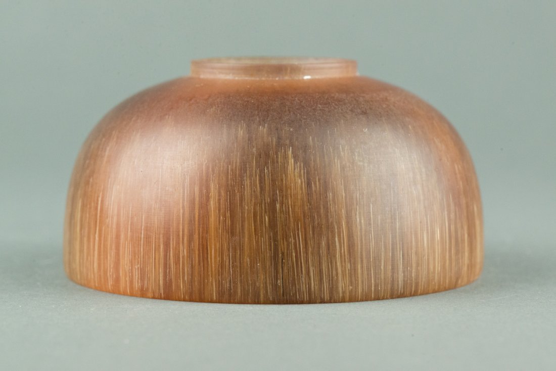 Chinese Horn Carved Waterpot: Chinese horn carved waterpot, of dome shaped, displays rich brown with fine hairline structures. H: 5.1 cm, D: 9.8 cm, 302 grams. Provenance: T. Ng Collection Toronto.